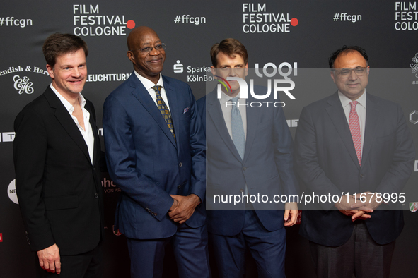 Edwin Moses, a former American hurdler, Leopold Hoesch, the producer, and Walid Nakschbandi, the managing director of Film and Mediam NRW, a...