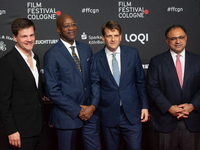 Edwin Moses, a former American hurdler, Leopold Hoesch, the producer, and Walid Nakschbandi, the managing director of Film and Mediam NRW, a...