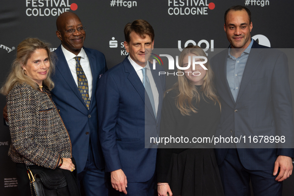 Edwin Moses, a former American hurdler, Ulrike Nasse-Meyfarth, Leopold Hoesch, and Julian Moses attend the screening of ''13 Steps - Die Ung...