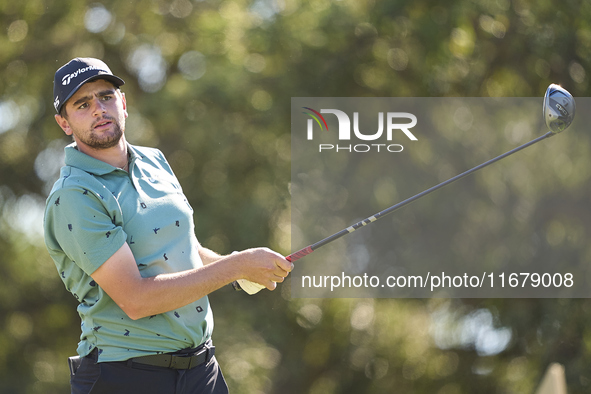 In San Roque, Spain, on October 18, 2024, Casey Jarvis of South Africa tees off on the 9th hole during the Estrella Damm N.A. Andalucia Mast...