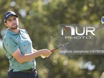 In San Roque, Spain, on October 18, 2024, Casey Jarvis of South Africa tees off on the 9th hole during the Estrella Damm N.A. Andalucia Mast...