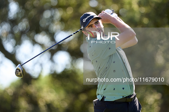 In San Roque, Spain, on October 18, 2024, Casey Jarvis of South Africa tees off on the 9th hole during the Estrella Damm N.A. Andalucia Mast...