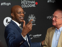 Edwin Moses, a former American hurdler, and Manfred Germar, a former Olympic hurdler, attend the screening of ''13 Steps - Die Unglaubliche...