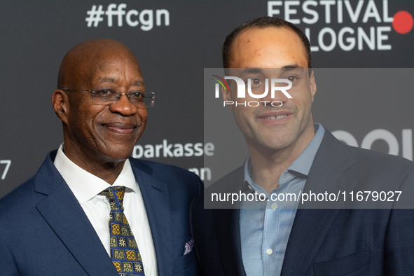 Edwin Moses, a former American hurdler, and Julian Moses, the son of Edwin Moses, attend the screening of ''13 Steps - Die Unglaubliche Karr...