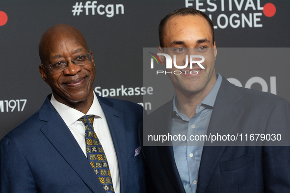 Edwin Moses, a former American hurdler, and Julian Moses, the son of Edwin Moses, attend the screening of ''13 Steps - Die Unglaubliche Karr...