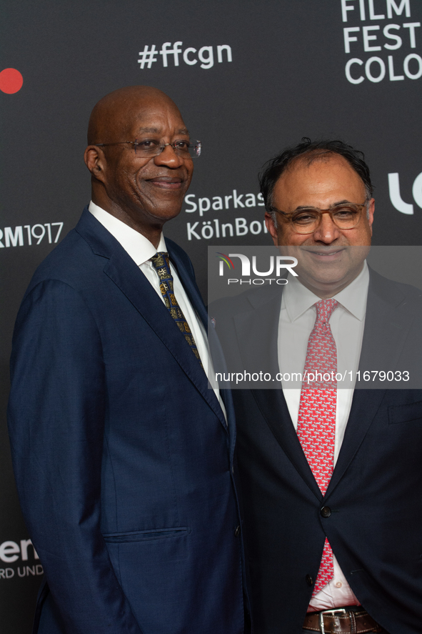 Edwin Moses, a former American hurdler, and Walid Nakschbandi, the managing director of Film and Media NRW, attend the screening of ''13 Ste...