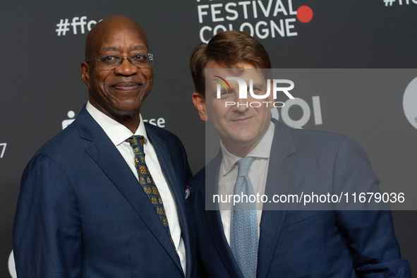 Edwin Moses, a former American hurdler, and Leopold Hoesch, the producer, attend the screening of ''13 Steps - Die Unglaubliche Karriere von...