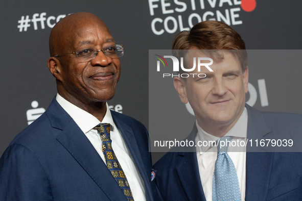 Edwin Moses, a former American hurdler, and Leopold Hoesch, the producer, attend the screening of ''13 Steps - Die Unglaubliche Karriere von...