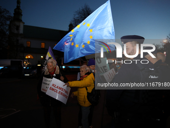 Activists protest against Jaroslaw Kaczynski's monthly visit to Wawel Hill in Krakow, Poland, on October 18, 2024. Every 18th day of the mon...