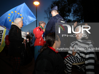 Activists protest against Jaroslaw Kaczynski's monthly visit to Wawel Hill in Krakow, Poland, on October 18, 2024. Every 18th day of the mon...