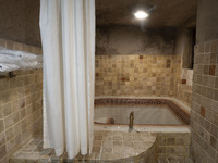 A view of a hot tub in a bathroom in a room of the Kandovan cliff hotel in the village of Kandovan, 650 km northwest of Tehran, Iran, on Oct...