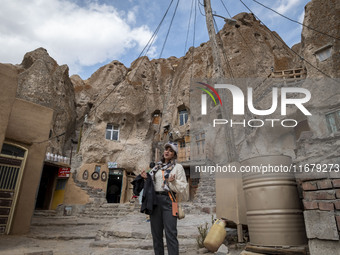 Iranian female blogger, Zahra Heidarpanah, known as Zarichii, sings an Iranian folklore song while visiting the Kandovan cliff village, 650...