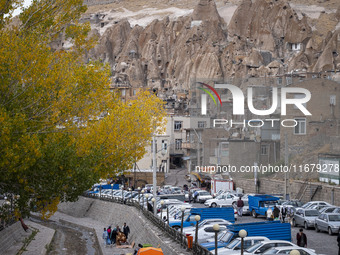 Iranian people visit the Kandovan cliff village, 650 km (400 miles) northwest of Tehran, Iran, on October 18, 2024. Kandovan is a village wh...