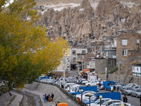 Iranian people visit the Kandovan cliff village, 650 km (400 miles) northwest of Tehran, Iran, on October 18, 2024. Kandovan is a village wh...