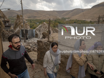 Iranian youths visit the Kandovan cliff village, 650 km (400 miles) northwest of Tehran, Iran, on October 18, 2024. Kandovan is a village wh...