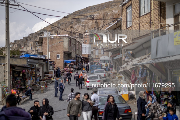 Iranian people visit the Kandovan cliff village, 650 km (400 miles) northwest of Tehran, Iran, on October 18, 2024. Kandovan is a village wh...