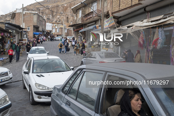 Iranian people visit the Kandovan cliff village, 650 km (400 miles) northwest of Tehran, Iran, on October 18, 2024. Kandovan is a village wh...