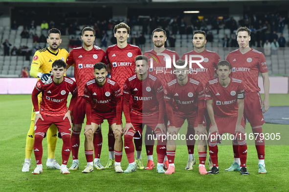 Players of Otelul Galati participate in the match between Universitatea Cluj and Otelul Galati at Cluj Arena in Cluj, Romania, on October 18...