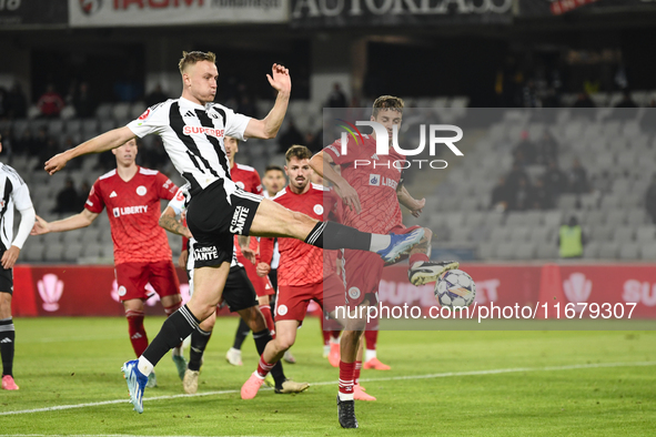 Jasper van der Werff and Juri Cisotti play during the Universitatea Cluj vs. Otelul Galati match at Cluj Arena in Cluj, Romania, on October...