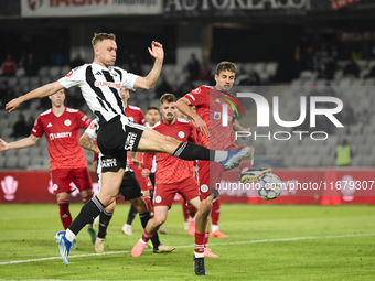 Jasper van der Werff and Juri Cisotti play during the Universitatea Cluj vs. Otelul Galati match at Cluj Arena in Cluj, Romania, on October...