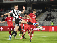 Jasper van der Werff and Juri Cisotti play during the Universitatea Cluj vs. Otelul Galati match at Cluj Arena in Cluj, Romania, on October...