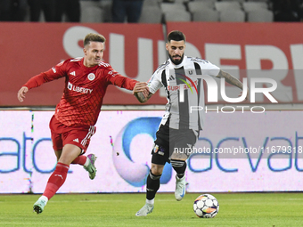 Alexandru Pop and Radu Boboc play during the Universitatea Cluj vs. Otelul Galati match at Cluj Arena in Cluj, Romania, on October 18, 2024....