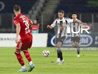 Alexandru Chipciu is in action during Universitatea Cluj versus Otelul Galati at Cluj Arena in Cluj, Romania, on October 18, 2024. (