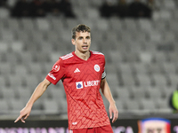 Juri Cisotti participates in the Universitatea Cluj vs. Otelul Galati match at Cluj Arena in Cluj, Romania, on October 18, 2024. (