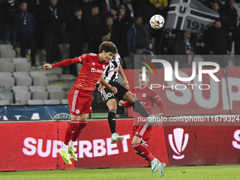 Miguel Silva and Dan Nistor play during the Universitatea Cluj vs. Otelul Galati match at Cluj Arena in Cluj, Romania, on October 18, 2024....