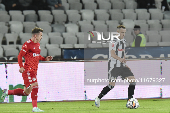 Robert Silaghi is in action during Universitatea Cluj versus Otelul Galati at Cluj Arena in Cluj, Romania, on October 18, 2024. 