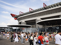 The audience attends Taylor Swift's The Eras Tour concert outside the Stadio San Siro in Milan, Italy, on July 13, 2024. (