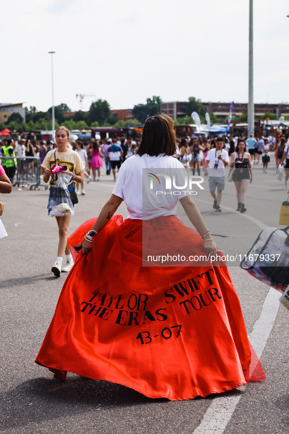 The audience attends Taylor Swift's The Eras Tour concert outside the Stadio San Siro in Milan, Italy, on July 13, 2024. 