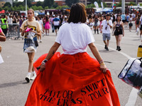 The audience attends Taylor Swift's The Eras Tour concert outside the Stadio San Siro in Milan, Italy, on July 13, 2024. (