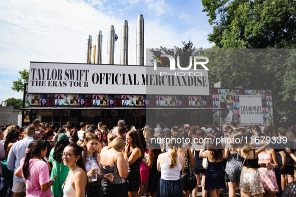 The audience attends Taylor Swift's The Eras Tour concert outside the Stadio San Siro in Milan, Italy, on July 13, 2024. 