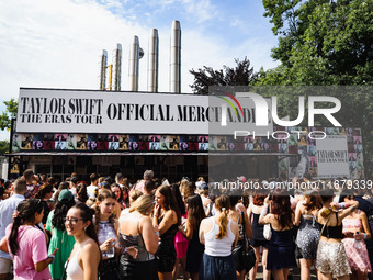 The audience attends Taylor Swift's The Eras Tour concert outside the Stadio San Siro in Milan, Italy, on July 13, 2024. (