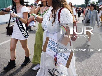 The audience attends Taylor Swift's The Eras Tour concert outside the Stadio San Siro in Milan, Italy, on July 13, 2024. (