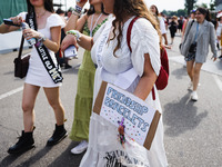 The audience attends Taylor Swift's The Eras Tour concert outside the Stadio San Siro in Milan, Italy, on July 13, 2024. (