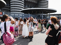 The audience attends Taylor Swift's The Eras Tour concert outside the Stadio San Siro in Milan, Italy, on July 13, 2024. (