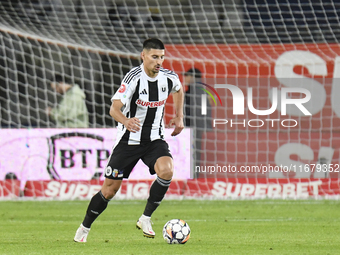 Iulian Cristea is in action during Universitatea Cluj v Otelul Galati at Cluj Arena in Cluj, Romania, on October 18, 2024 (