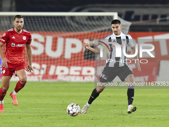 Iulian Cristea is in action during Universitatea Cluj v Otelul Galati at Cluj Arena in Cluj, Romania, on October 18, 2024 (