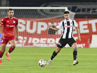 Iulian Cristea is in action during Universitatea Cluj v Otelul Galati at Cluj Arena in Cluj, Romania, on October 18, 2024 (