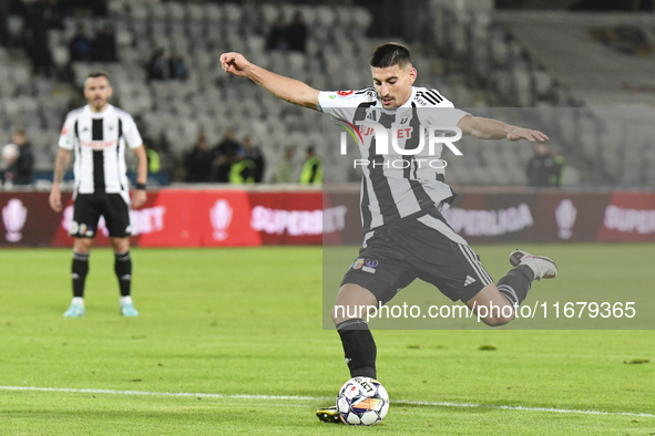 Iulian Cristea is in action during Universitatea Cluj v Otelul Galati at Cluj Arena in Cluj, Romania, on October 18, 2024 