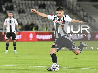 Iulian Cristea is in action during Universitatea Cluj v Otelul Galati at Cluj Arena in Cluj, Romania, on October 18, 2024 (