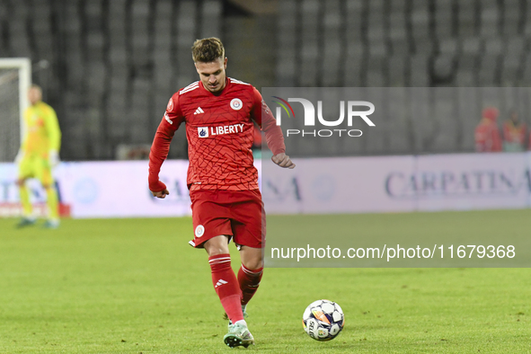 Alexandru Mihai Pop plays during the Universitatea Cluj vs. Otelul Galati match at Cluj Arena in Cluj, Romania, on October 18, 2024. 