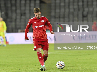 Alexandru Mihai Pop plays during the Universitatea Cluj vs. Otelul Galati match at Cluj Arena in Cluj, Romania, on October 18, 2024. (