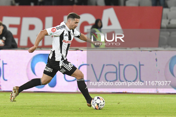 Alexandru Chipciu is in action during Universitatea Cluj versus Otelul Galati at Cluj Arena in Cluj, Romania, on October 18, 2024. 