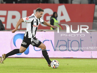 Alexandru Chipciu is in action during Universitatea Cluj versus Otelul Galati at Cluj Arena in Cluj, Romania, on October 18, 2024. (