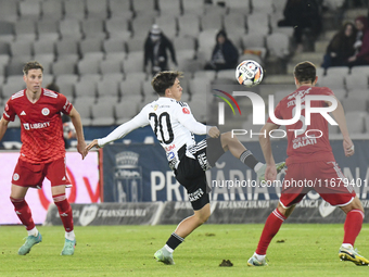 Axeanadru Bota is in action during the Universitatea Cluj vs. Otelul Galati match at Cluj Arena in Cluj, Romania, on October 18, 2024 (