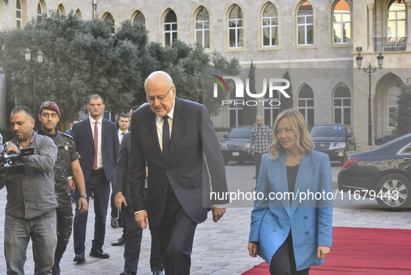 Lebanese Prime Minister Najib Mikati welcomes his Italian counterpart Giorgia Meloni ahead of their meeting at the Beirut governmental palac...