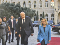 Lebanese Prime Minister Najib Mikati welcomes his Italian counterpart Giorgia Meloni ahead of their meeting at the Beirut governmental palac...